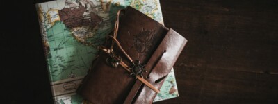Image of leather notebook on folded up map