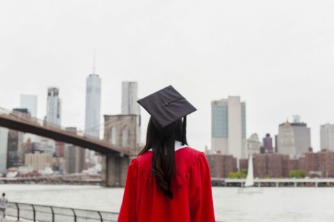 College Grad looking At City