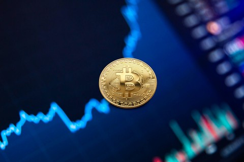 bitcoin on top of financial chart