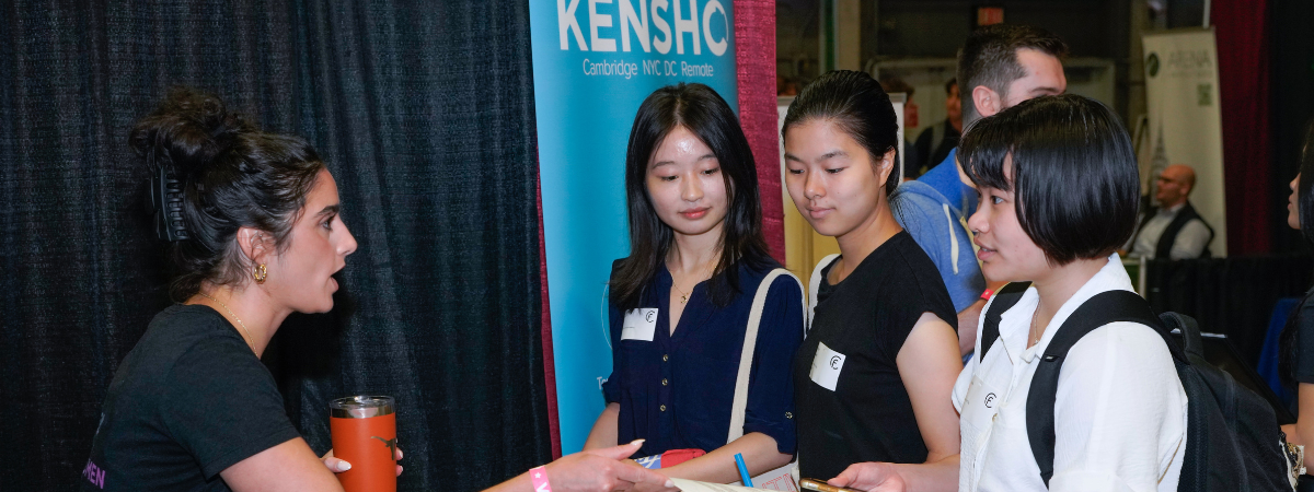 MIT students speak with an employer representative at the Kensho booth during the Fall 2024 MIT Career Fair.