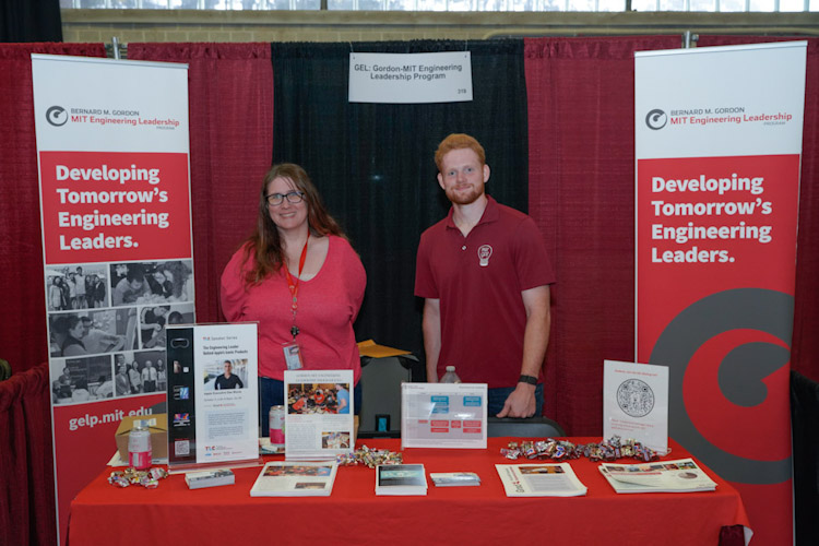 Vendors smiling at camera ready to speak to students at the fall career fair--fcf