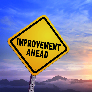 a sign with the words "improvement ahead" written