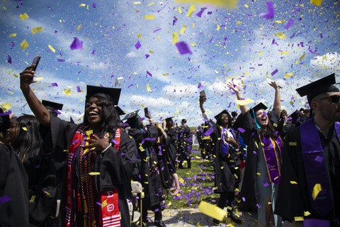 Students celebrating graduation