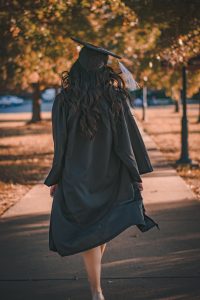 Graduate Walking in Cap & Gown