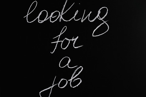 Words on a chalk board written: looking for a job