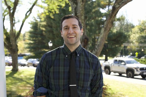 Justin Goot smiling outside