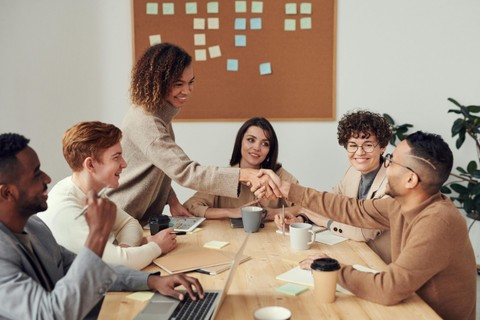 People talking around table