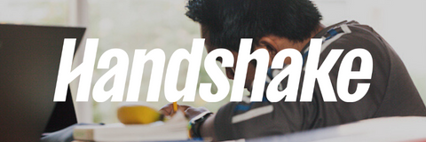 Handshake logo over an image of a student studying