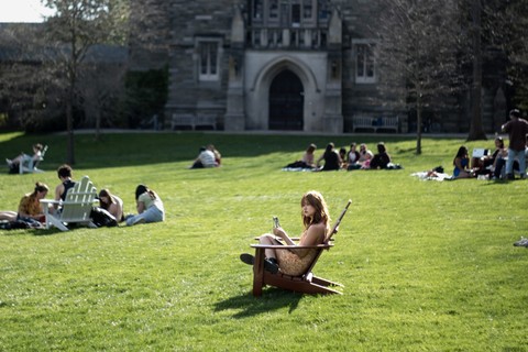 Students lounge on Parrish Beach on the campus of Swarthmore College.