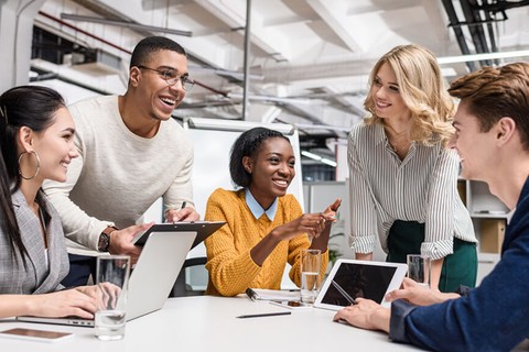 Young professionals talking happily