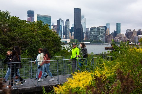 Students heading towards Luminescence during a walking tour of Hunters Point South and Long Island City led by Hobum Moon (M.R.P. '14, M.L.A. '16) and Robert Balder, Executive Director of the Gensler Family AAP NYC Center. September 30, 2023. Credit: Melanie Chu (M.Arch. '24) / Cornell College of Architecture, Art, and Planning.