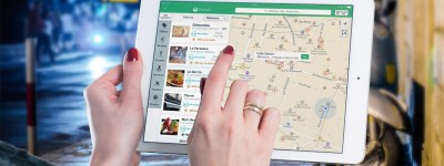 close up of person looking at a map on an ipad