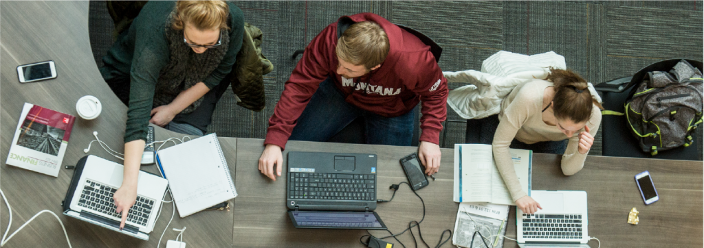3 students working on computers