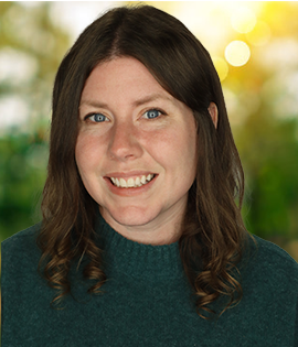 headshot of Jenah Mead in front of green background