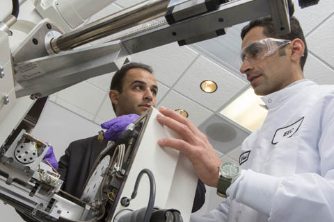 Stock image of two people in a lab.
