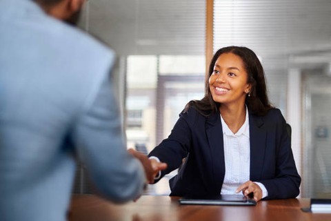 woman-shaking-a-mans-hand