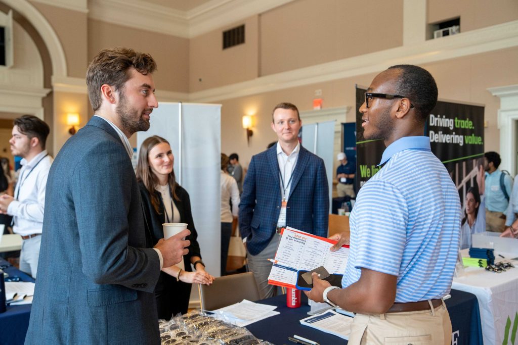 People talking at a career fair