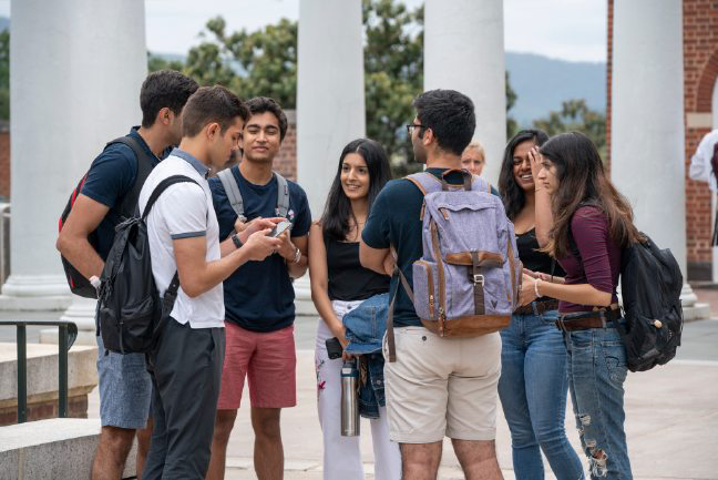 inclusive group of UVA students standing outside.