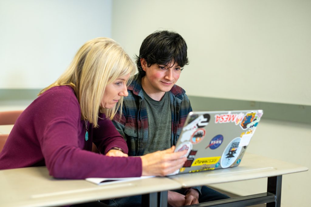 Advisor meeting with a student.