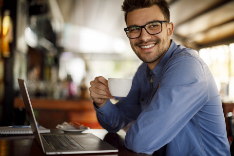Man with Laptop and coffee