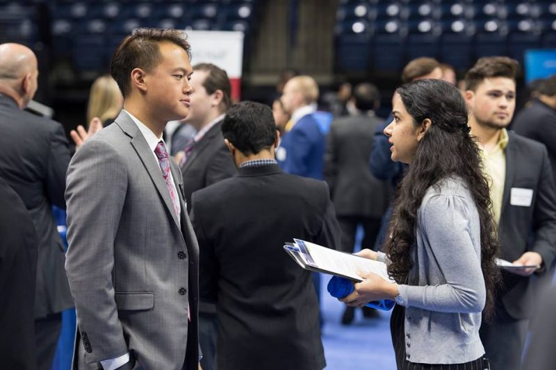 Student and Employer talk at the STEM Career Fair