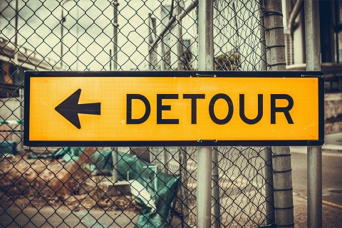 Detour street sign