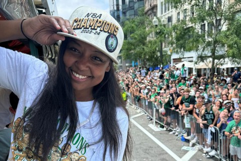 Taylor Kielpinski-Rogers ’12 (ED), vice president of communications for the Boston Celtics, is pictured at the team's championship parade in Boston in June 2024.