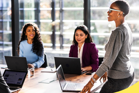 A team meeting around a conference table.