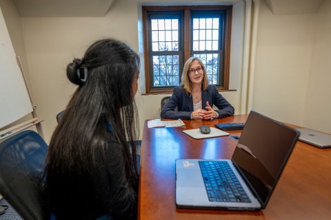 Student and professor talking about court classes at UConn Law on Nov 18t 2025